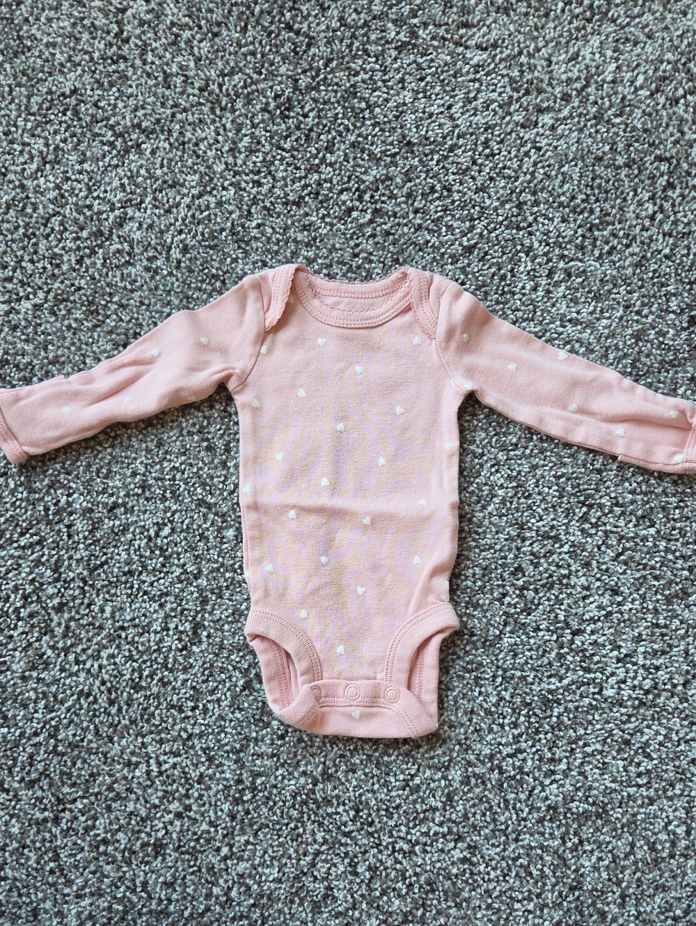 Carter's Long-Sleeve Baby One-Piece in Soft Pink with Tiny White Hearts
